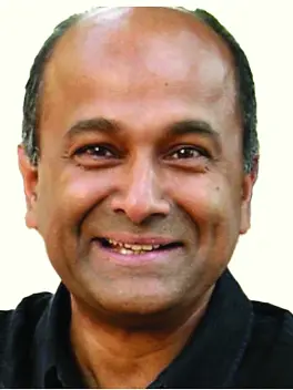 Dr. Dilip Menon